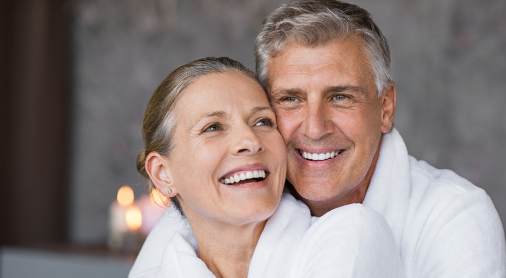 couple smiling at a spa