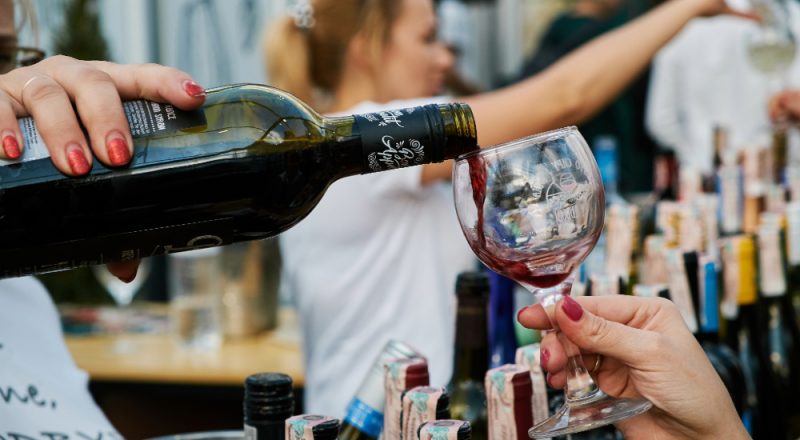 pouring wine into a glass